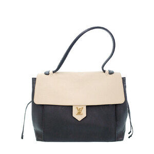Louis Vuitton Lock Me Handbag